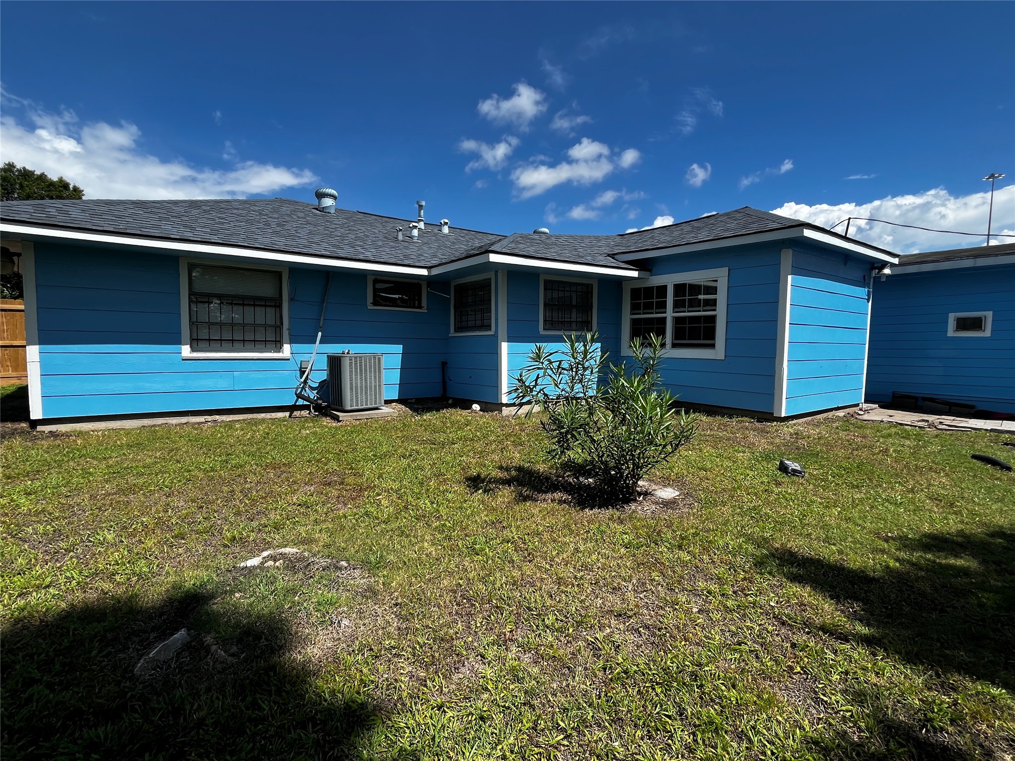 3163 Roe Drive Houston, TX 77087 - Photo 10 of 47 a view of a yard in front of a house with a yard