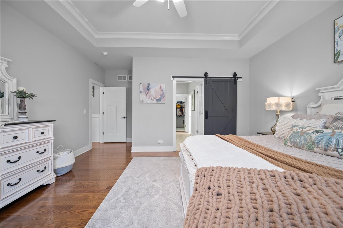 1383 Dodson Avenue Elburn, IL 60119 - Photo 13 of 25 a bedroom with a bed and a dresser