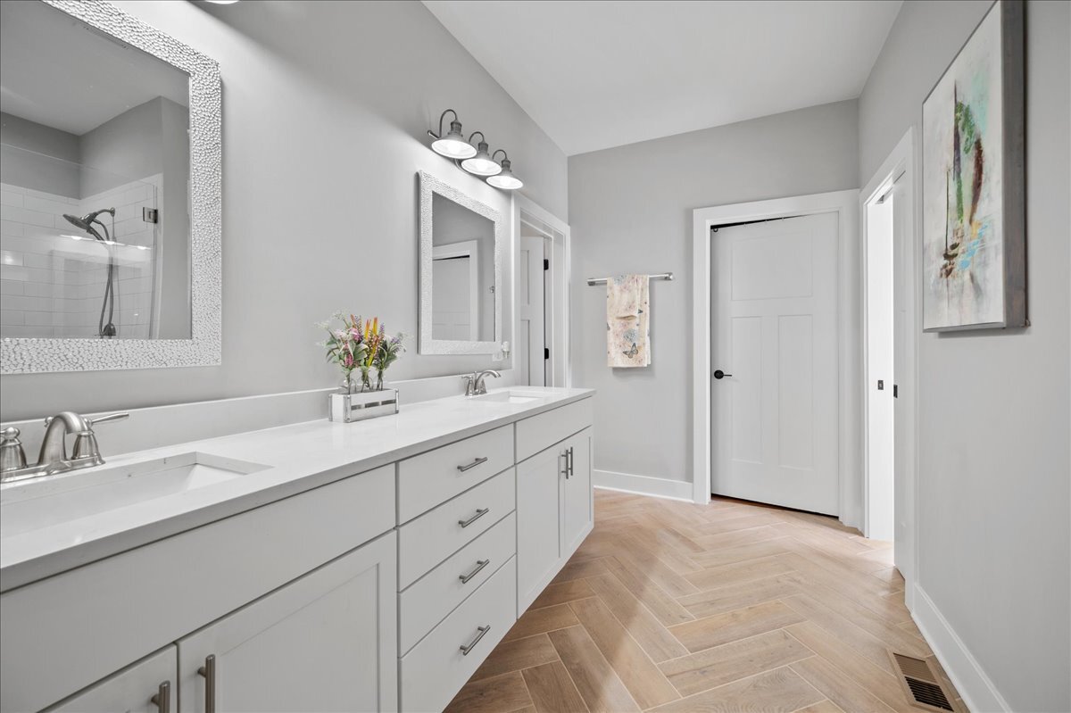 1383 Dodson Avenue Elburn, IL 60119 - Photo 14 of 25 a spacious bathroom with a double vanity sink mirror and