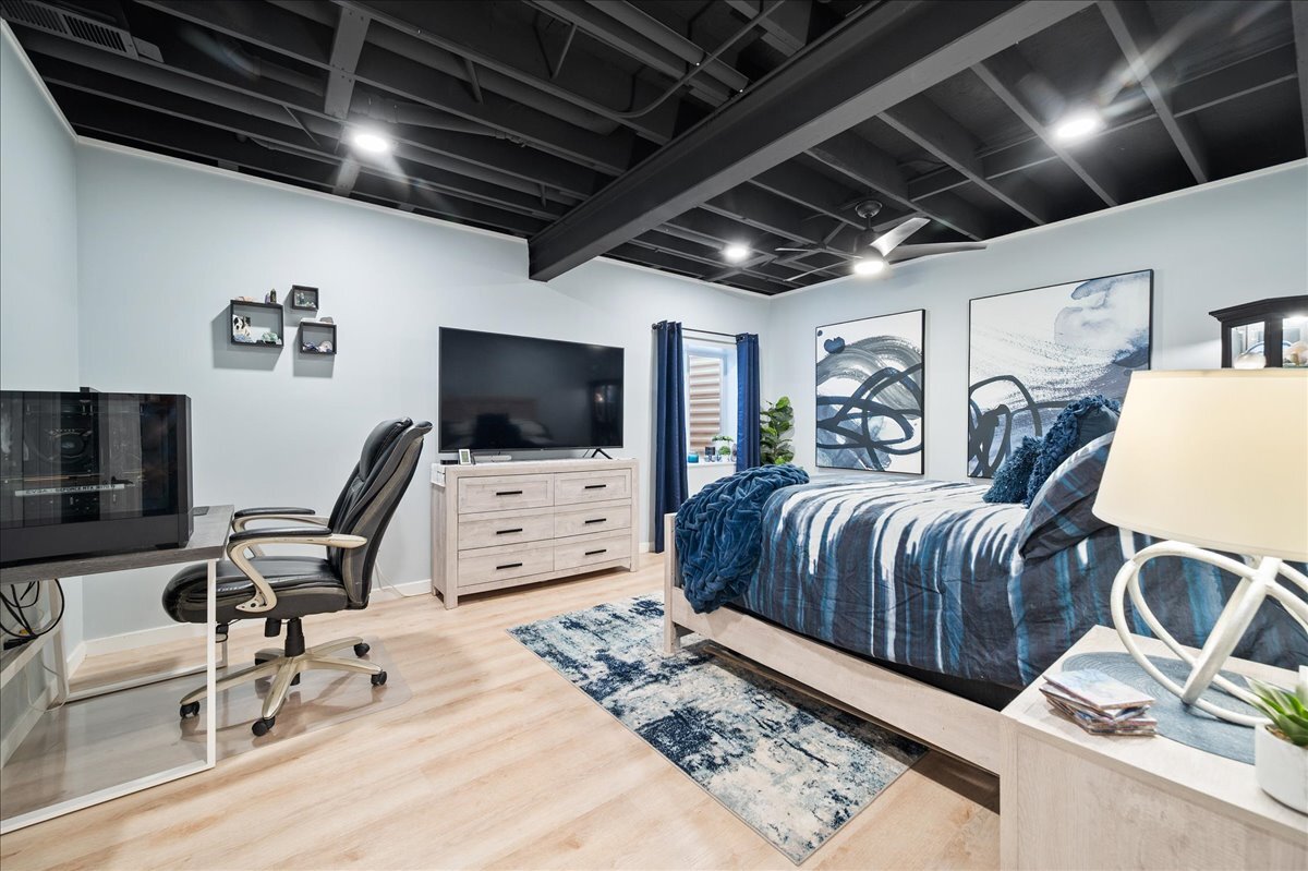 1383 Dodson Avenue Elburn, IL 60119 - Photo 19 of 25 a bedroom with furniture and a flat screen tv