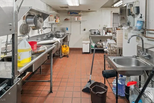 a street view with large trees