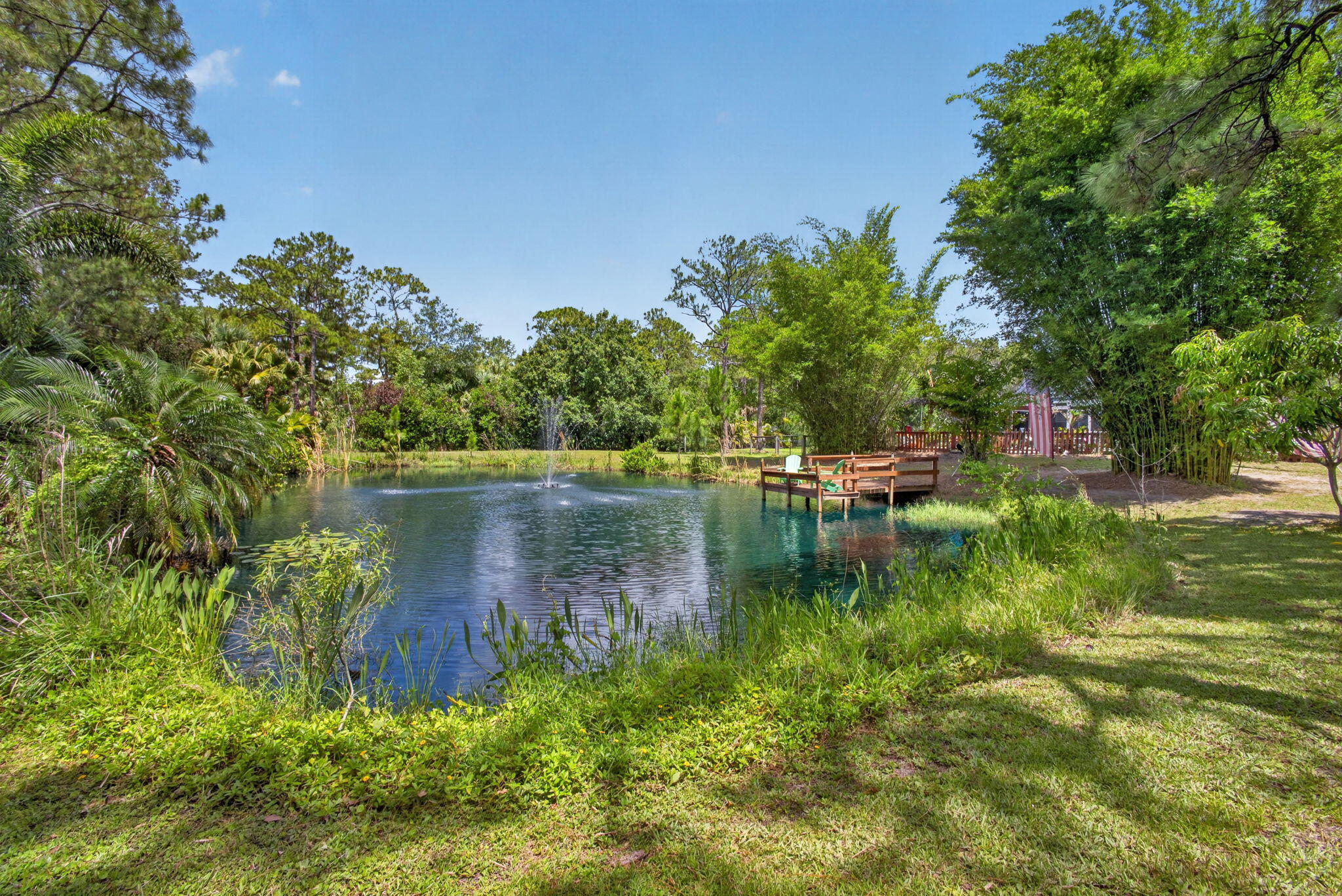 12558 165th Road North Jupiter, FL 33478 - Photo 13 of 67 a view of lake with green space