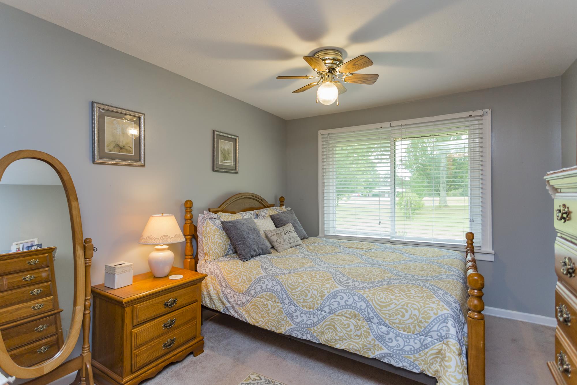 785 Danley Road Charlotte, TN 37036 - Photo 17 of 30 Both master bed and second bedroom on main floor have ceiling fans.