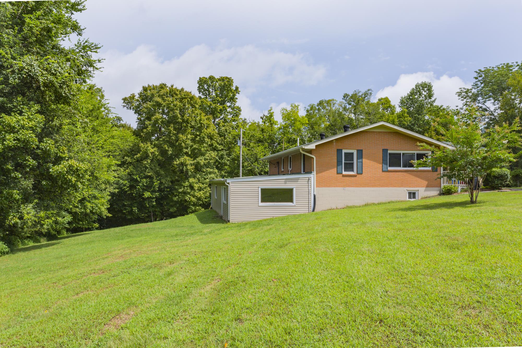 785 Danley Road Charlotte, TN 37036 - Photo 25 of 30 You can do whatever your heart desires with the space available for outdoor activities.