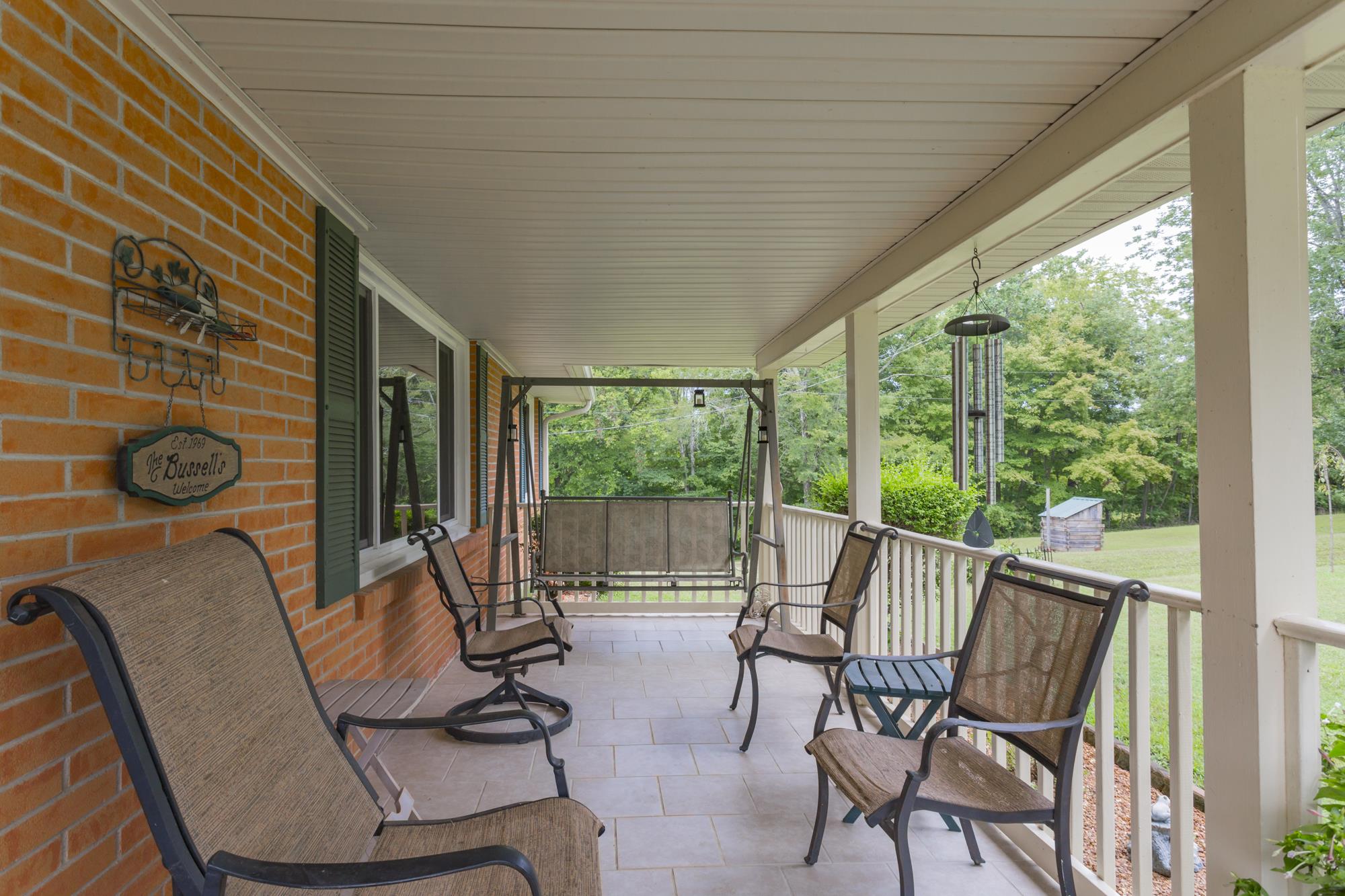 785 Danley Road Charlotte, TN 37036 - Photo 5 of 30 Enjoy the view while sitting on your front porch.
