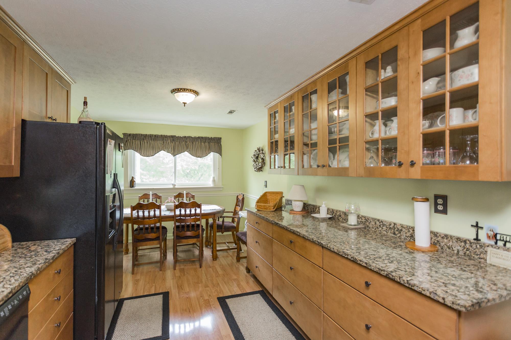 785 Danley Road Charlotte, TN 37036 - Photo 10 of 30 Plenty of cupboard space to display your dishes.