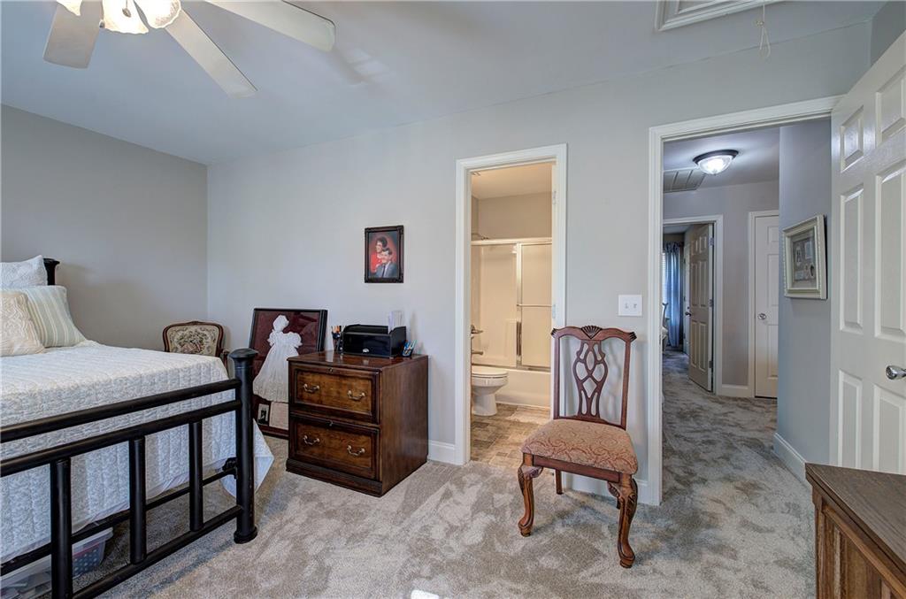 618 Manor Way Cartersville, GA 30120 - Photo 22 of 35 a bedroom with furniture and a window