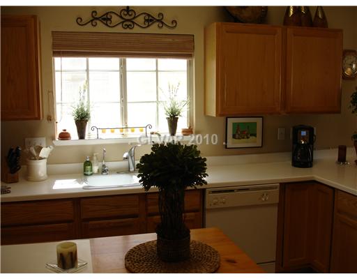 5205 Rim View Lane Las Vegas, NV 89130 - Photo 11 of 25 Kitchen. Love to have a window over the sink!