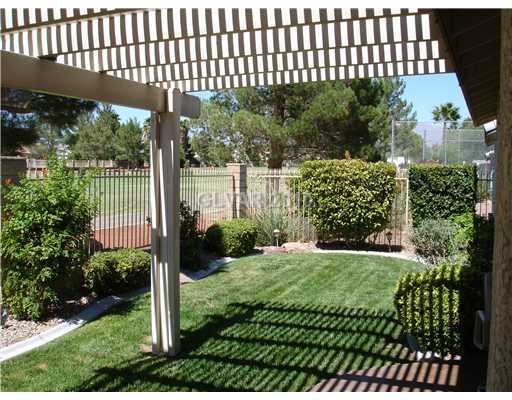 5205 Rim View Lane Las Vegas, NV 89130 - Photo 24 of 25 View. View of the right rear yard. Backyard is completely fenced for safety of pets.