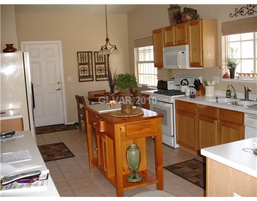 5205 Rim View Lane Las Vegas, NV 89130 - Photo 7 of 25 Kitchen. While you are relaxing in the Nook, you can keep a close eye on dinner while it s cooking.