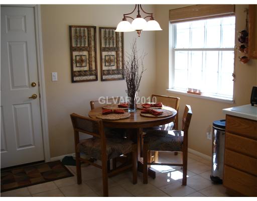 5205 Rim View Lane Las Vegas, NV 89130 - Photo 9 of 25 Kitchen. The Kitchen Nook is a cozy, comfortable spot to eat informally.