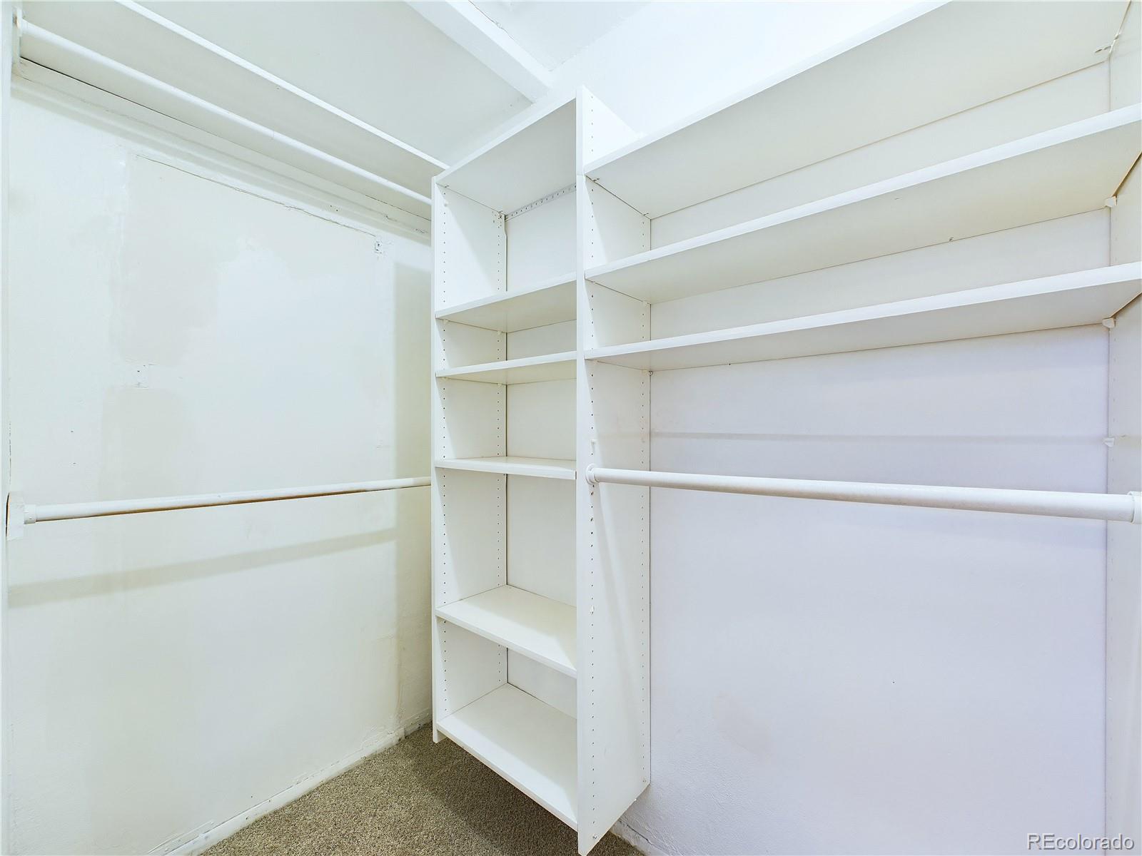 8770 Rainbow Avenue, Unit B4 Denver, CO 80229 - Photo 21 of 29 a view of an empty walk in closet