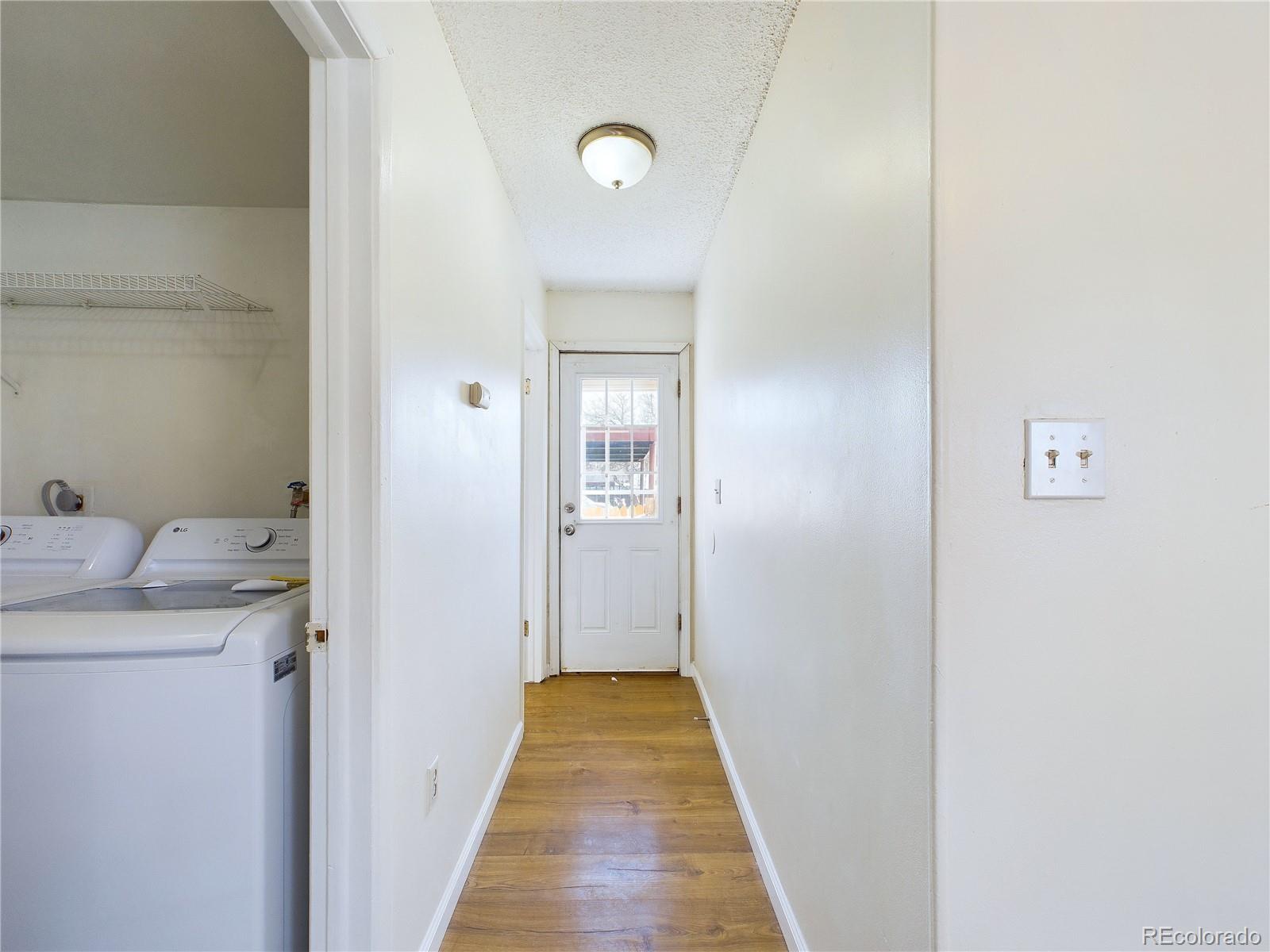 8770 Rainbow Avenue, Unit B4 Denver, CO 80229 - Photo 10 of 29 a view of a bathroom from the hallway