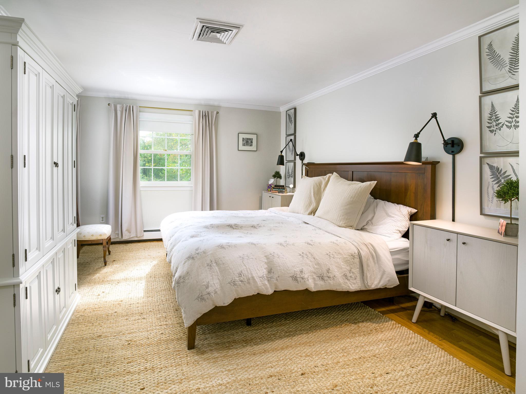 870 Goshen Road Newtown Square, PA 19073 - Photo 17 of 31 a bedroom with a bed and a window