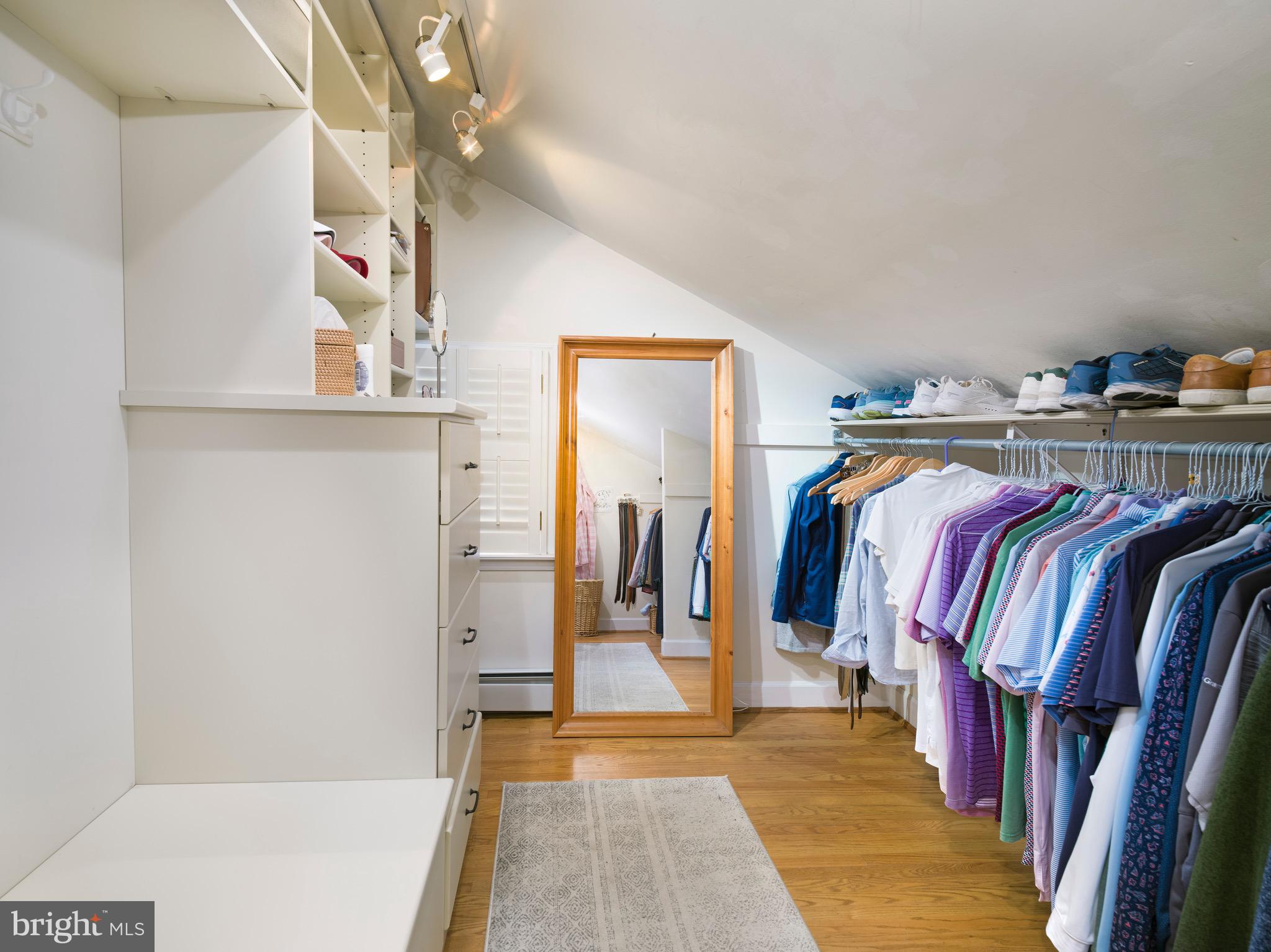 870 Goshen Road Newtown Square, PA 19073 - Photo 19 of 31 a view of walk in closet with clothes and shoes