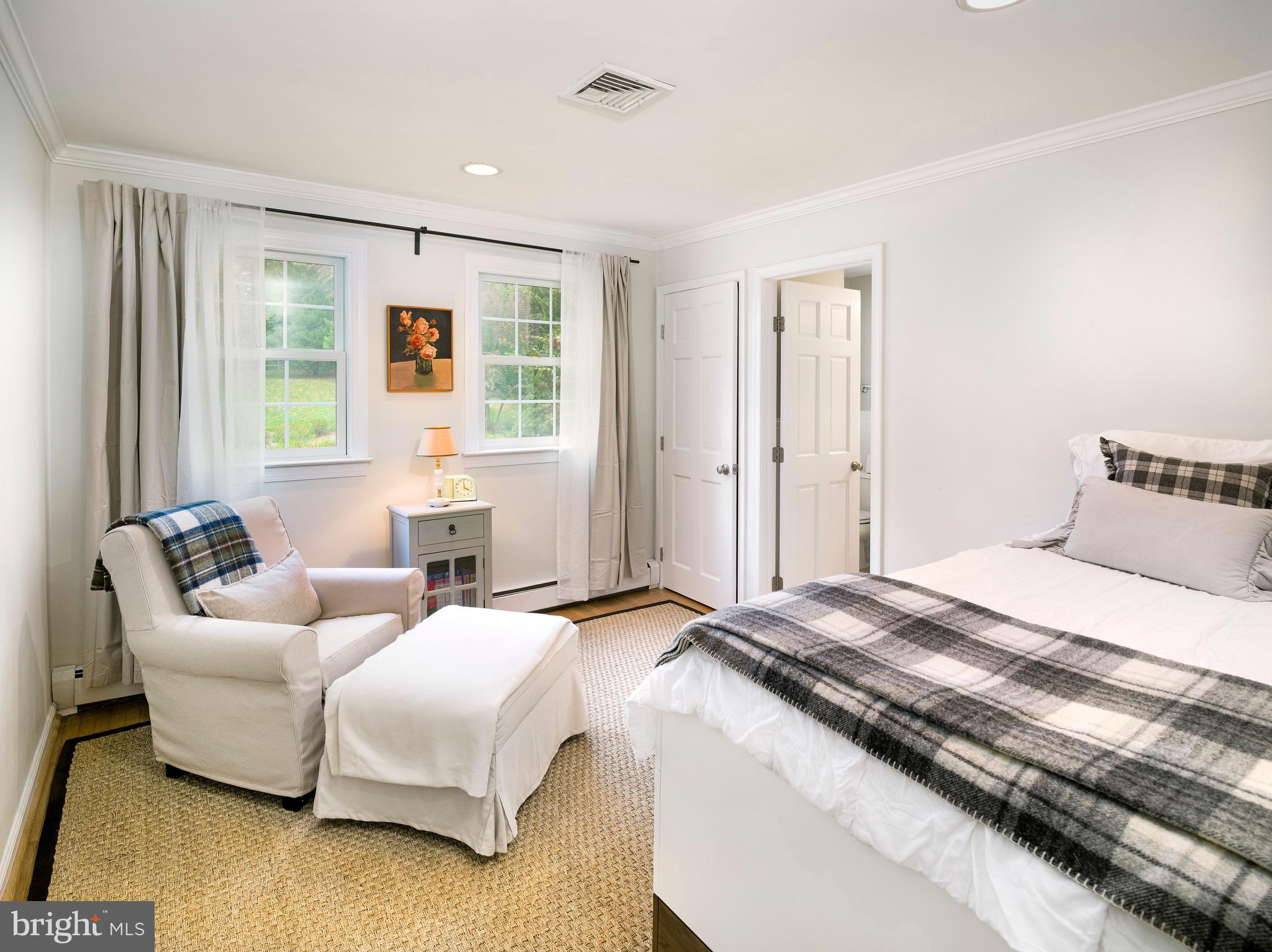 870 Goshen Road Newtown Square, PA 19073 - Photo 23 of 31 a bedroom with a bed and a couch