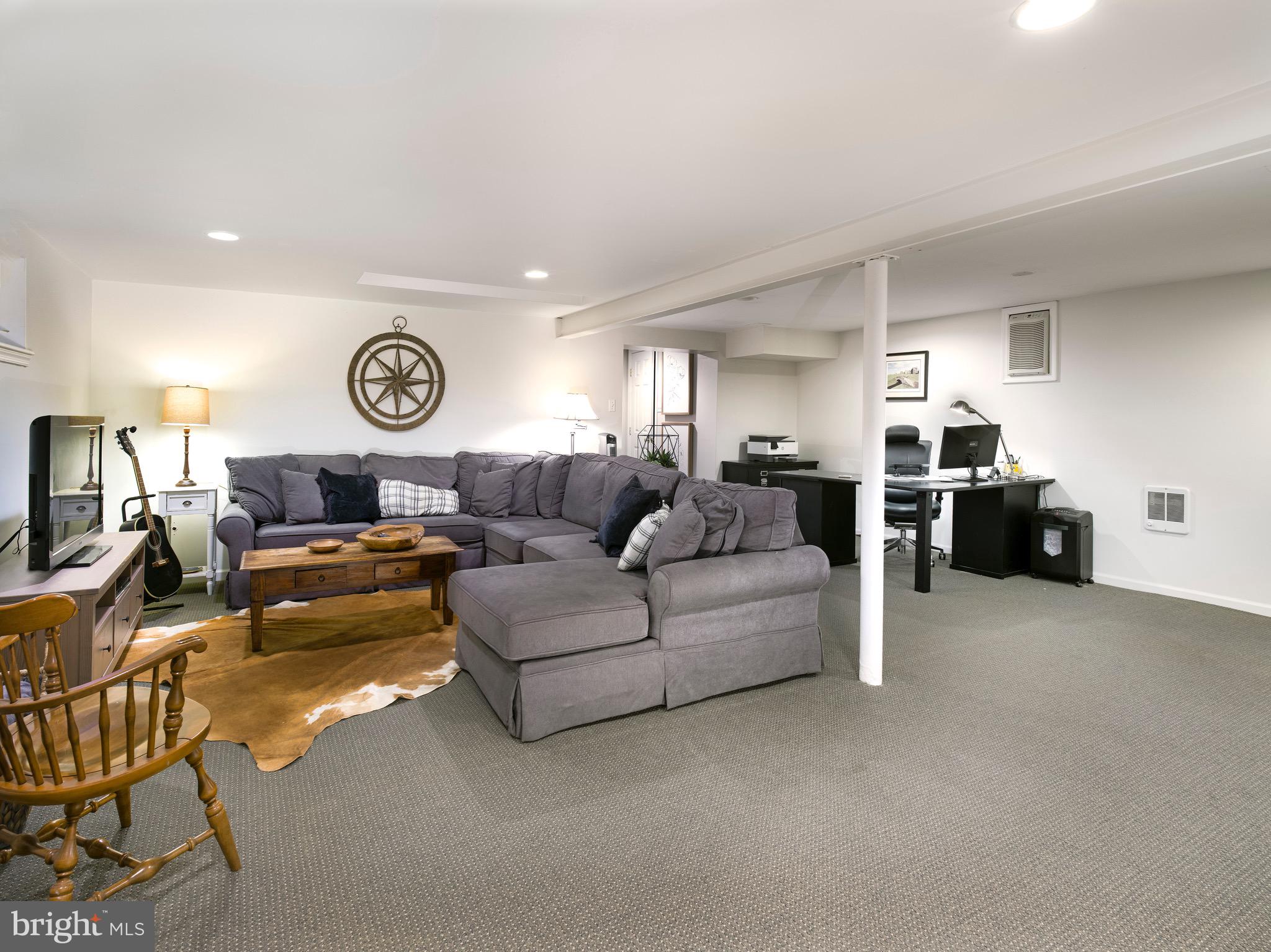 870 Goshen Road Newtown Square, PA 19073 - Photo 24 of 31 a living room with furniture and kitchen view