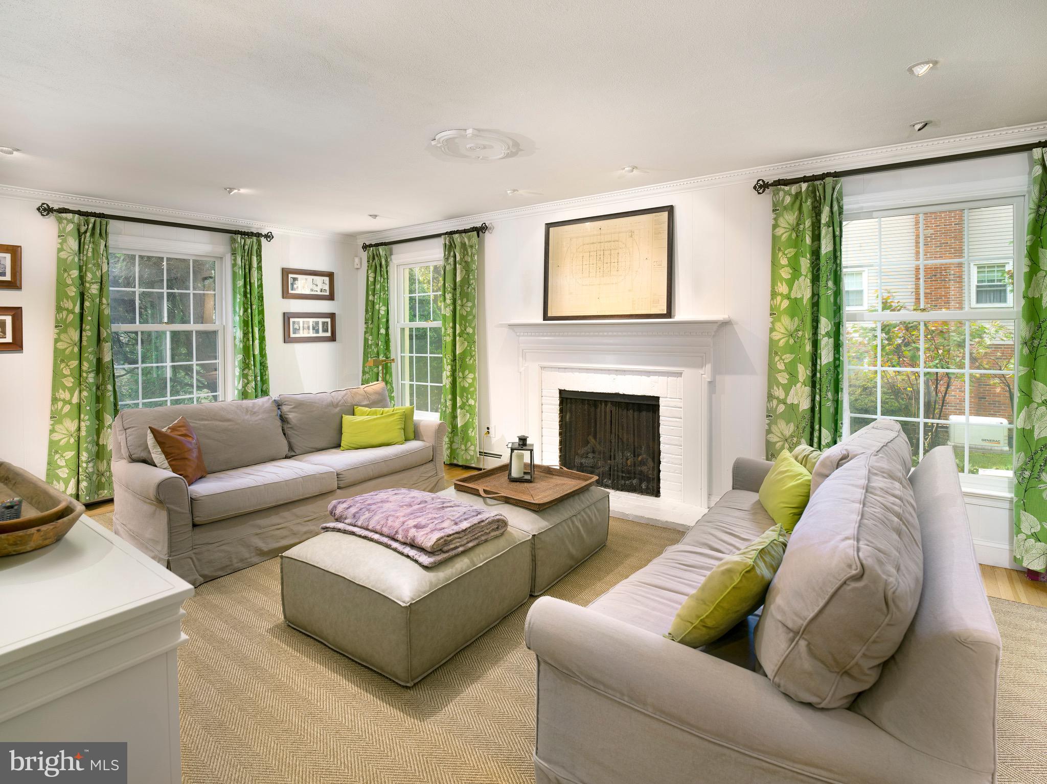 870 Goshen Road Newtown Square, PA 19073 - Photo 6 of 31 a living room with furniture and a fireplace