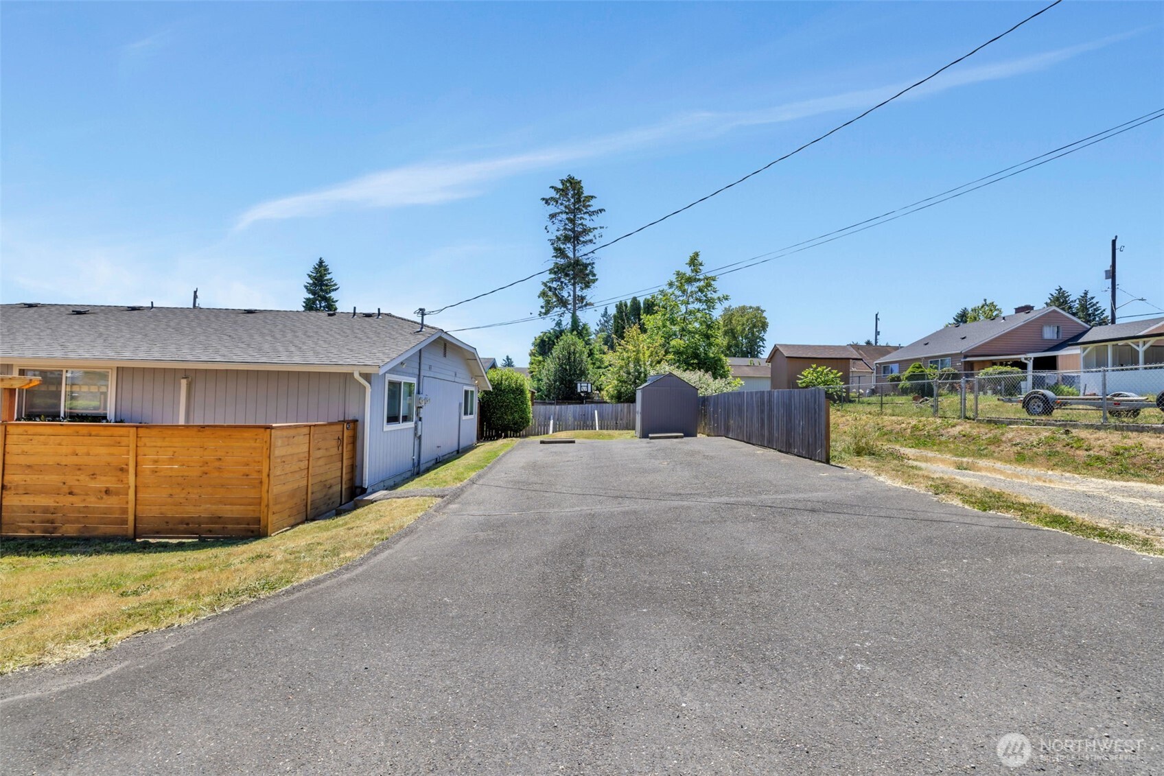 10201 17th Avenue Southwest Seattle, WA 98146 - Photo 24 of 27 a view of a house with a yard