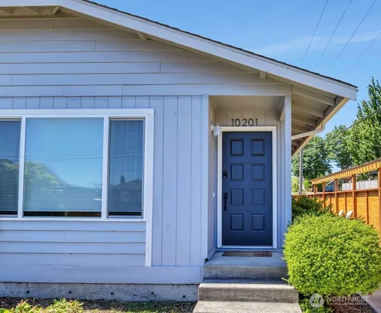a front view of a house with a garage