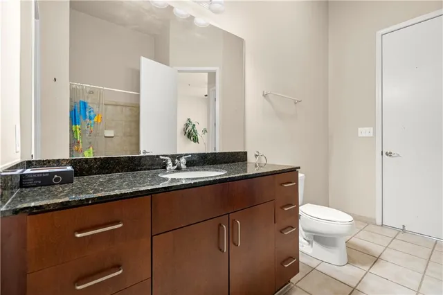 a bathroom with a tub and a shower