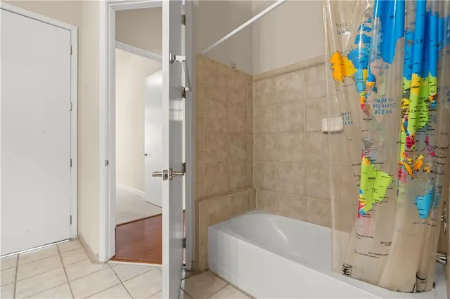 a bathroom with a toilet a sink and a mirror