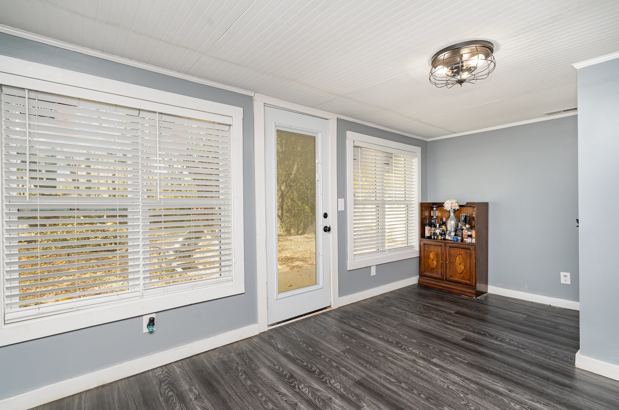 104 Morningside Drive Portland, TN 37148 - Photo 7 of 19 a view of an empty room with window and wooden floor