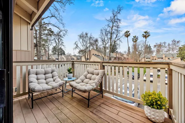 a view of a chairs on the deck