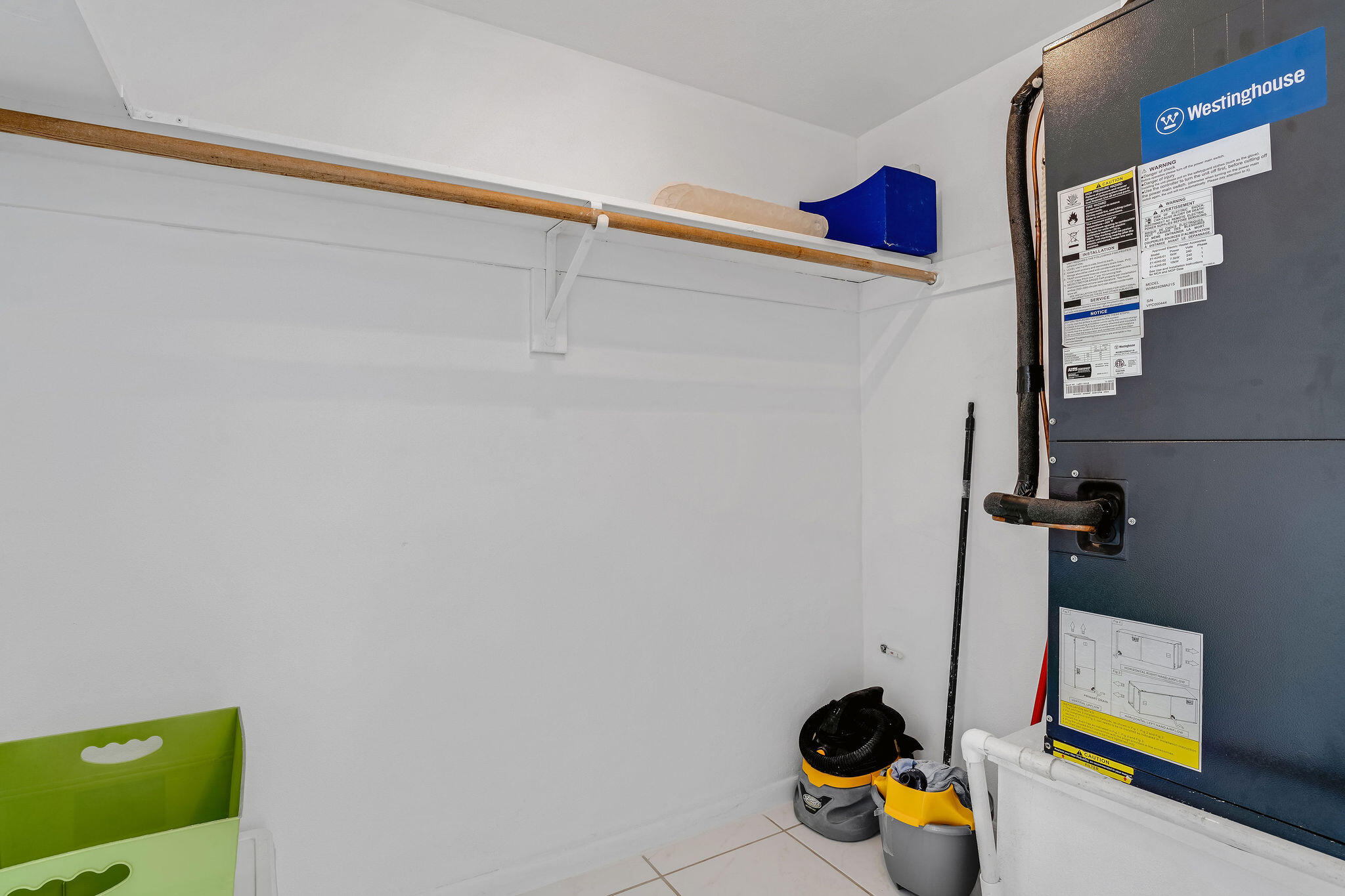 2050 Northeast 39th Street, Unit E307 Lighthouse Point, FL 33064 - Photo 26 of 42 a bathroom with a sink and a mirror