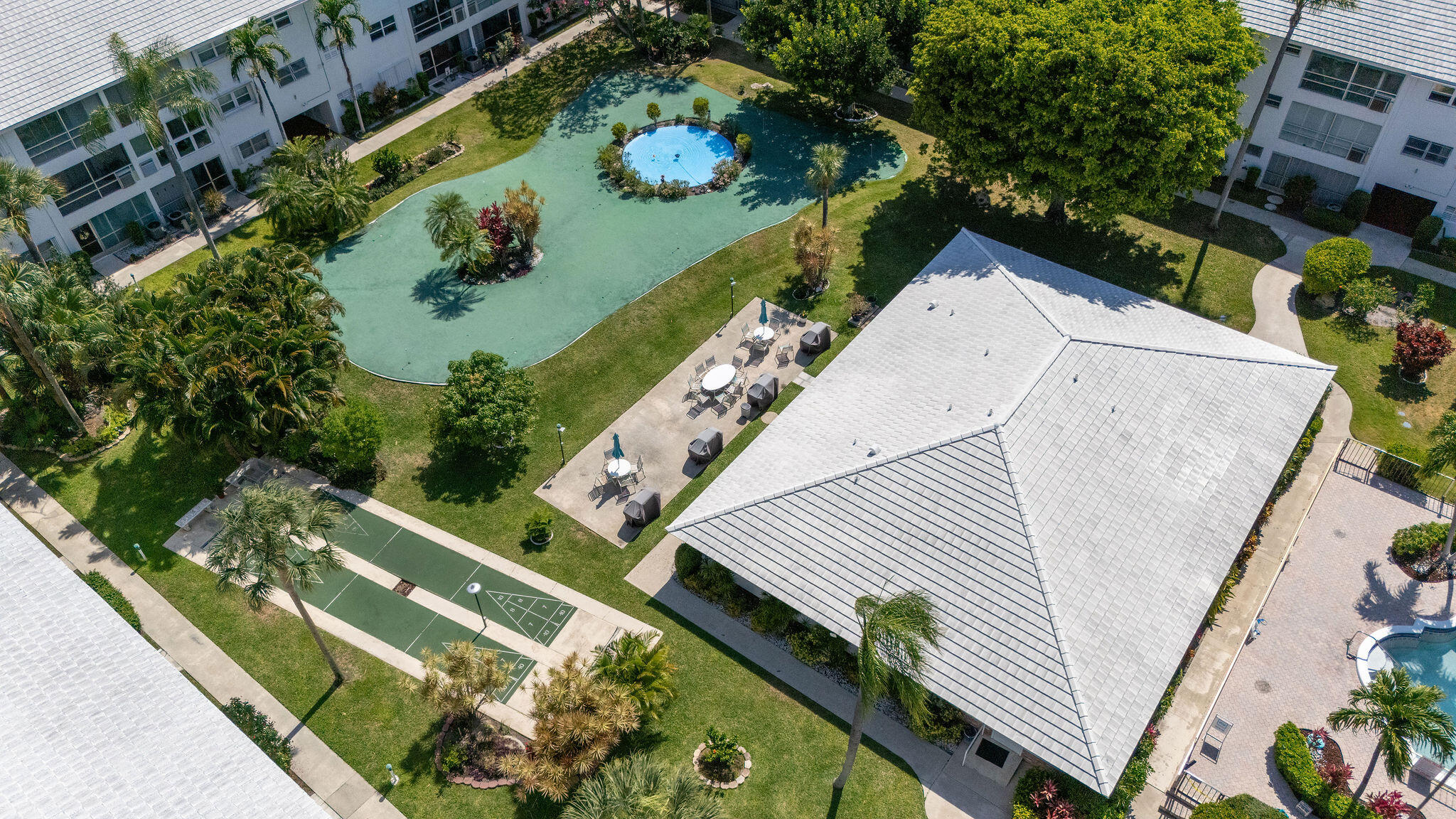 2050 Northeast 39th Street, Unit E307 Lighthouse Point, FL 33064 - Photo 40 of 42 an aerial view of a house