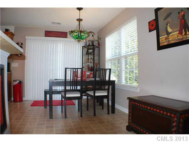 155 Mott Road Mooresville, NC 28115 - Photo 5 of 9 a dining room with furniture and window