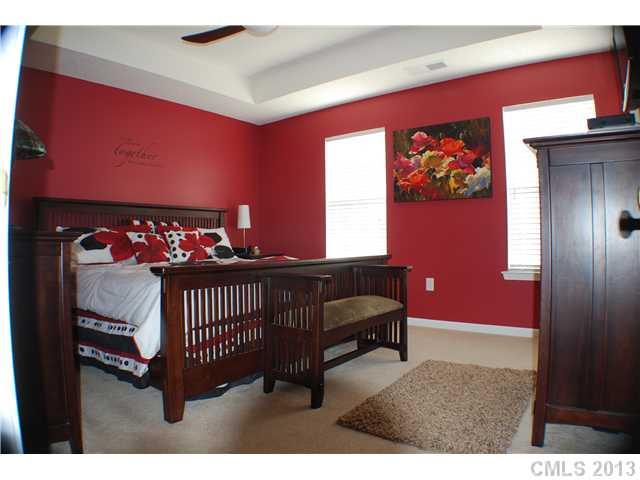 155 Mott Road Mooresville, NC 28115 - Photo 6 of 9 a bedroom with furniture and a window