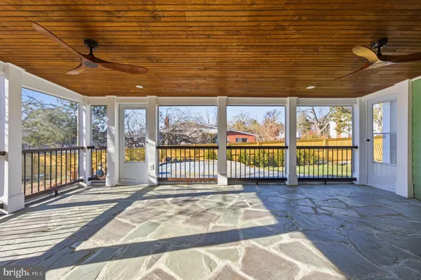 a view of an empty room with a balcony