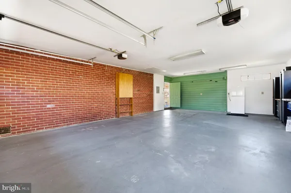a view of a livingroom with a staircase