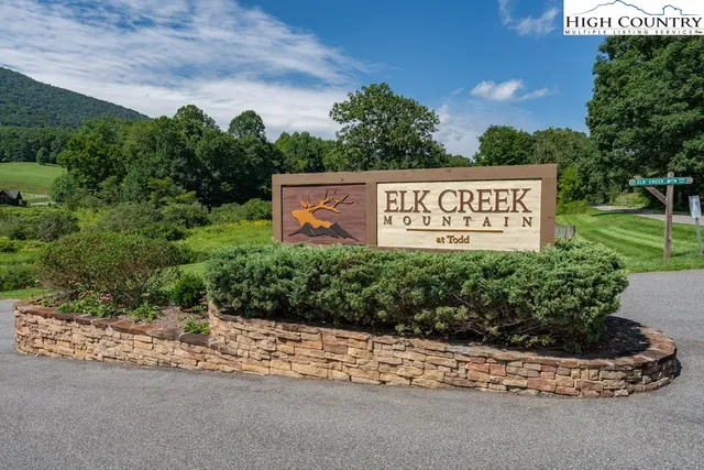 a view of swimming pool with a yard