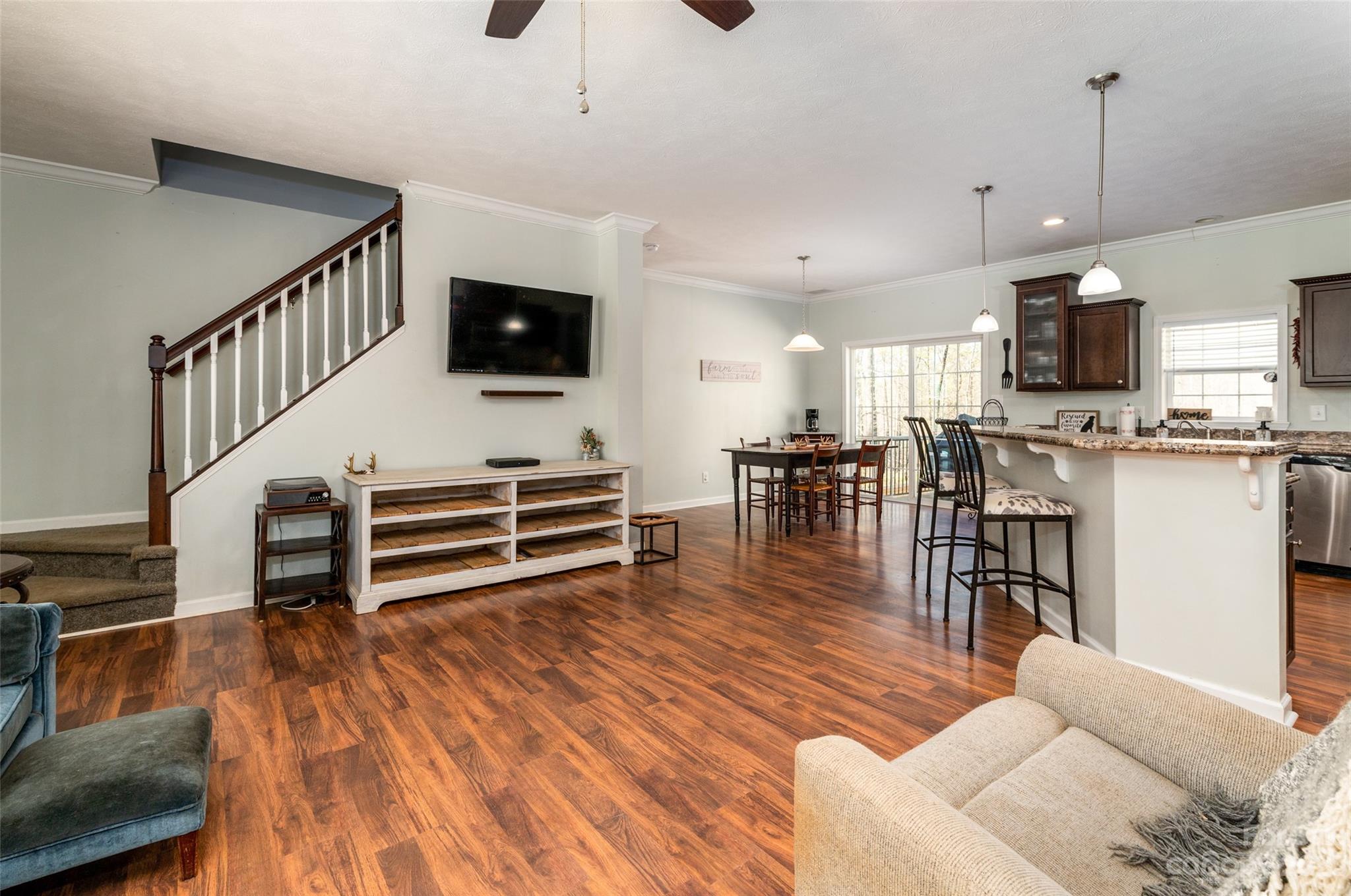 740 Renshaw Ford Road Woodleaf, NC 27054 - Photo 15 of 33 a living room with stainless steel appliances furniture a kitchen view and living room view
