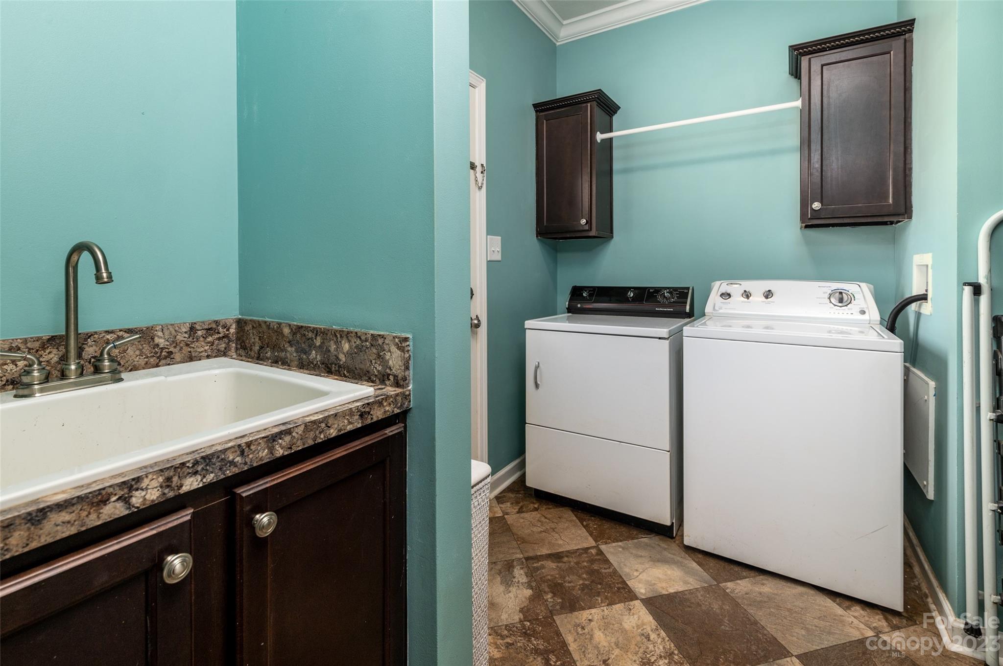 740 Renshaw Ford Road Woodleaf, NC 27054 - Photo 20 of 33 a utility room with dryer and washer