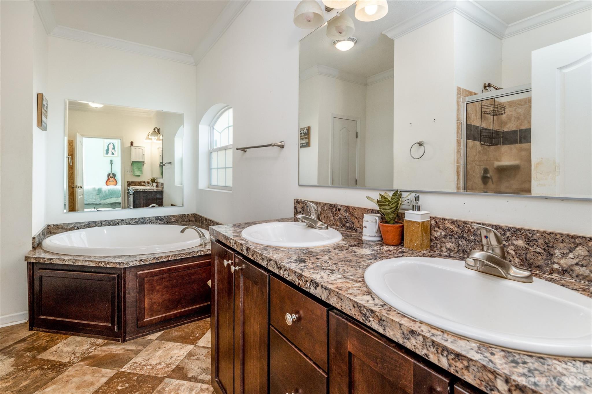 740 Renshaw Ford Road Woodleaf, NC 27054 - Photo 23 of 33 a bathroom with a granite countertop sink and a mirror