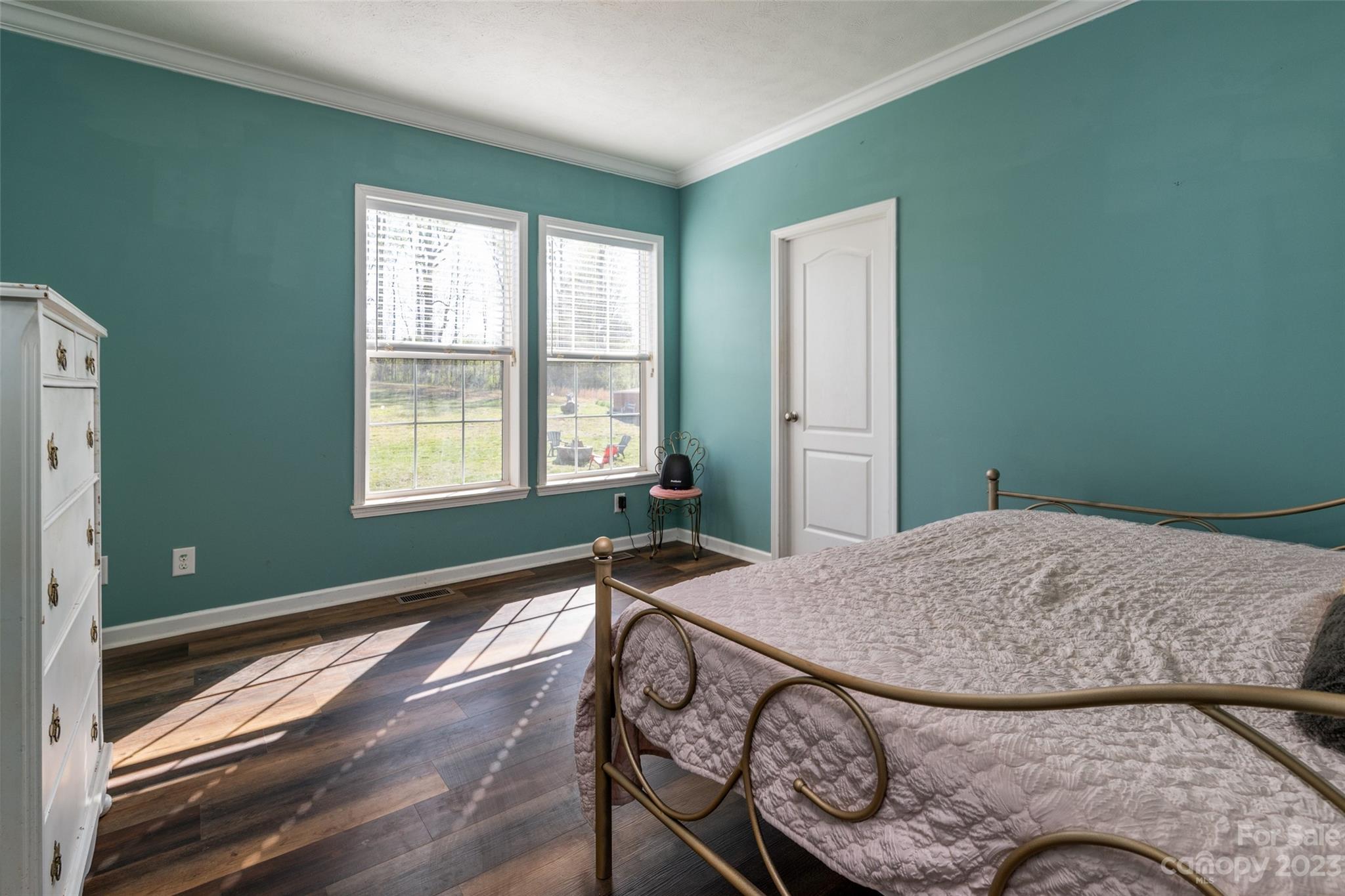 740 Renshaw Ford Road Woodleaf, NC 27054 - Photo 25 of 33 a bedroom with a bed and a window