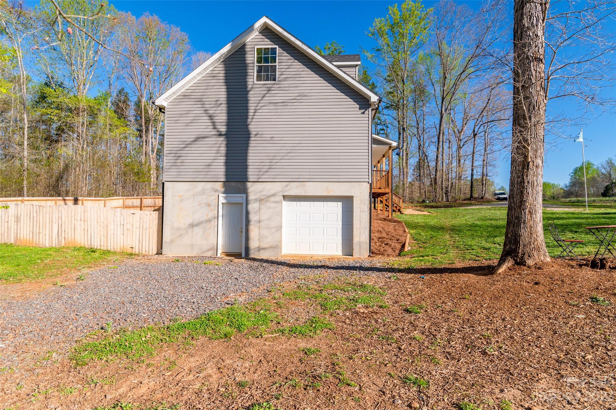 740 Renshaw Ford Road Woodleaf, NC 27054 - Photo 7 of 33 a view of a house with a yard