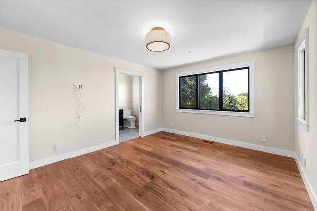 a swimming pool with outdoor seating and yard