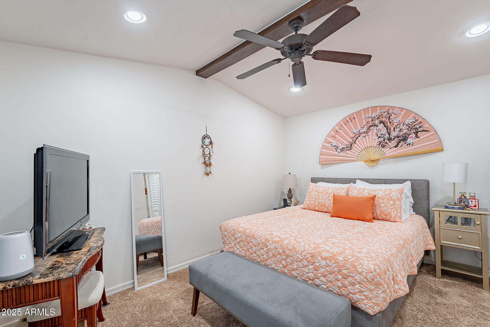 15606 South Gilbert Road, Unit 63 Chandler, AZ 85225 - Photo 13 of 21 a bedroom with a bed and a flat screen tv