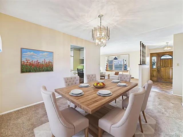 a kitchen with a sink appliances and cabinets