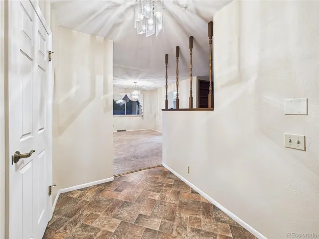 a view of a hallway with entryway