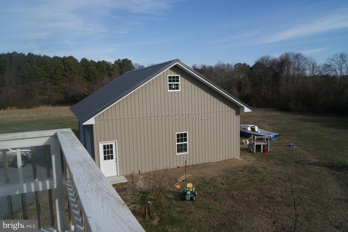 10995 Roland Parks Road Deal Island, MD 21821 - Photo 13 of 30 a house view with a outdoor space