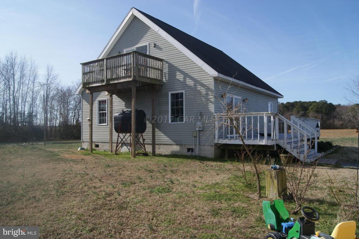 10995 Roland Parks Road Deal Island, MD 21821 - Photo 23 of 30 a view of a house with a yard