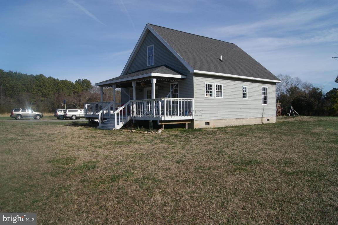 10995 Roland Parks Road Deal Island, MD 21821 - Photo 29 of 30 a view of a house with a yard