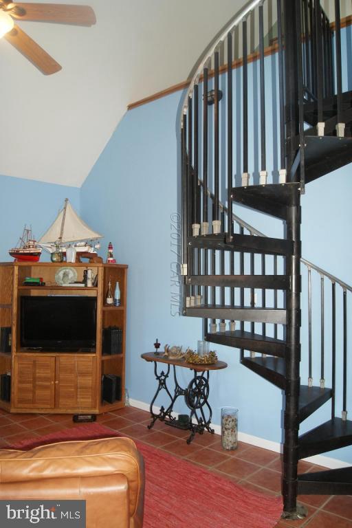 10995 Roland Parks Road Deal Island, MD 21821 - Photo 7 of 30 a bedroom with furniture and a window