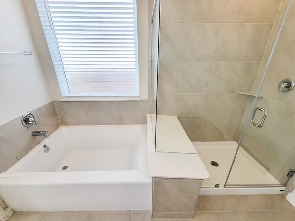 a bathroom with a white tub