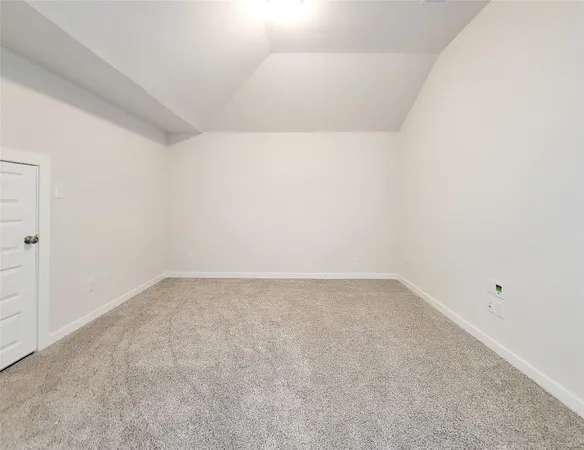 a room with a bed and a window